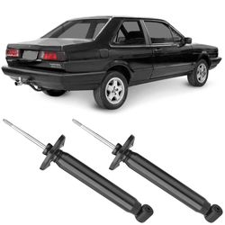 Amortecedores-traseiros-Monroe-para-Santana-84-a-90-compativeis-com-motorista-e-passageiro-em-fundo-de-carro-preto-