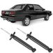 Amortecedores-traseiros-Monroe-para-Santana-84-a-90-compativeis-com-motorista-e-passageiro-em-fundo-de-carro-preto-