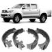 sapata-lona-freio-toyota-hilux-2005-a-2022-traseira-akebono-208802-syl-hipervarejo-2